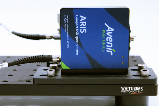 Compact UV-VIS Avenir Spectrometer conveniently mounted on optical breadboard.