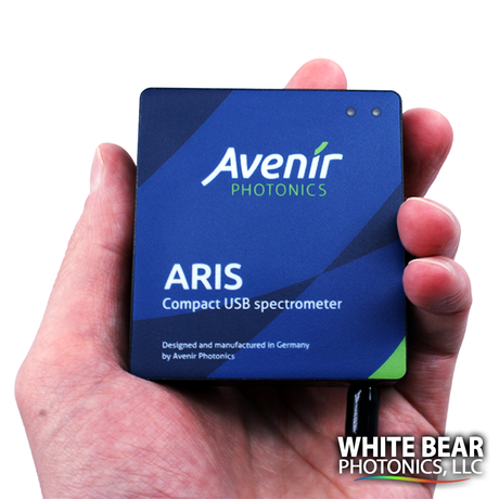 Compact USB UV VIS spectrometer by Avenir Photonics held in a hand